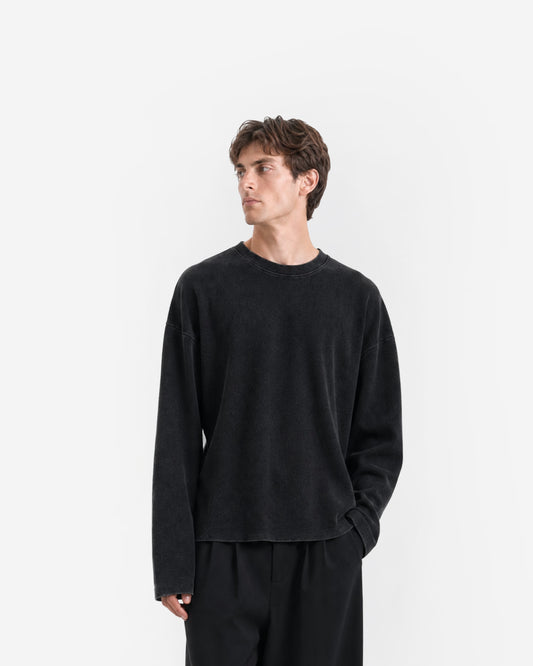 Raw Edge Long Sleeve Tee in Jet Black – worn by model, front view