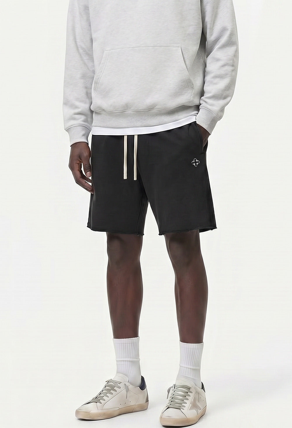 Raw Edge Emblem Shorts