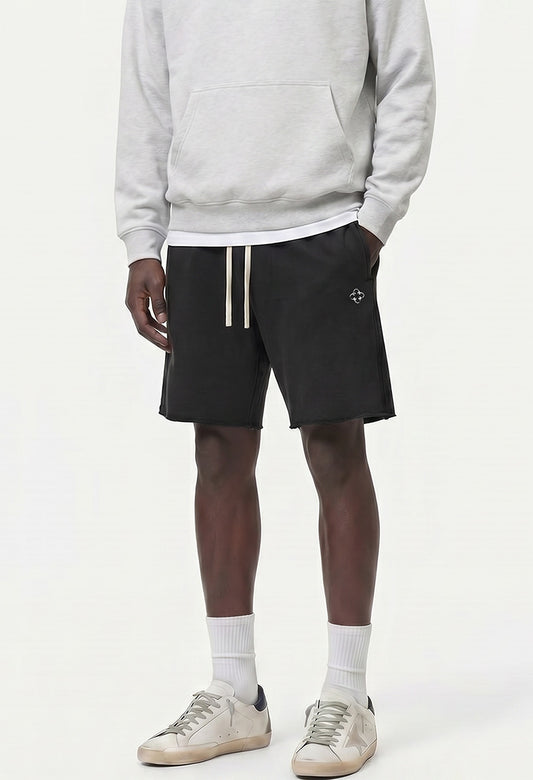 Raw Edge Emblem Shorts