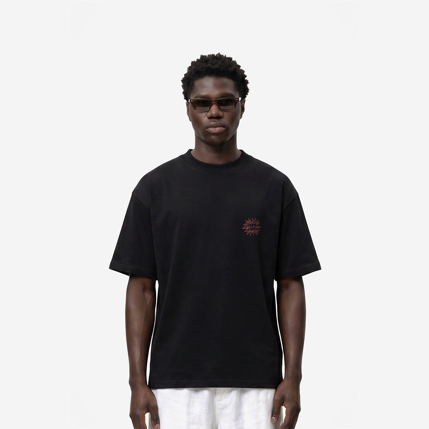 Born To Experience Tee in Black – worn by model, front view