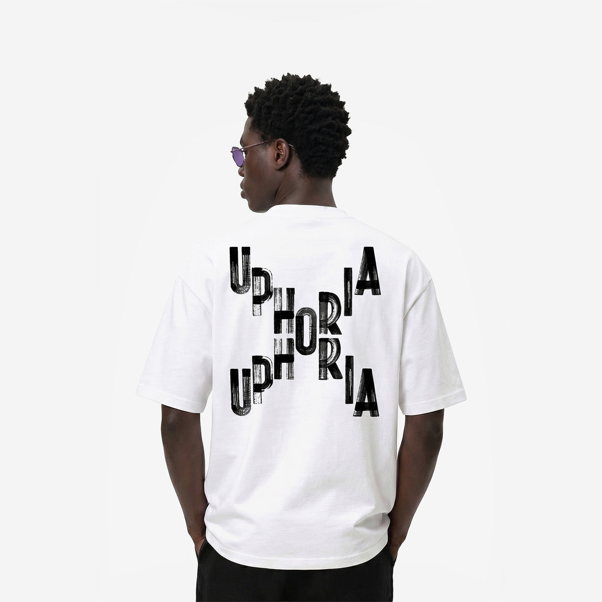 Signature Cross Tee in White – worn by model, back view