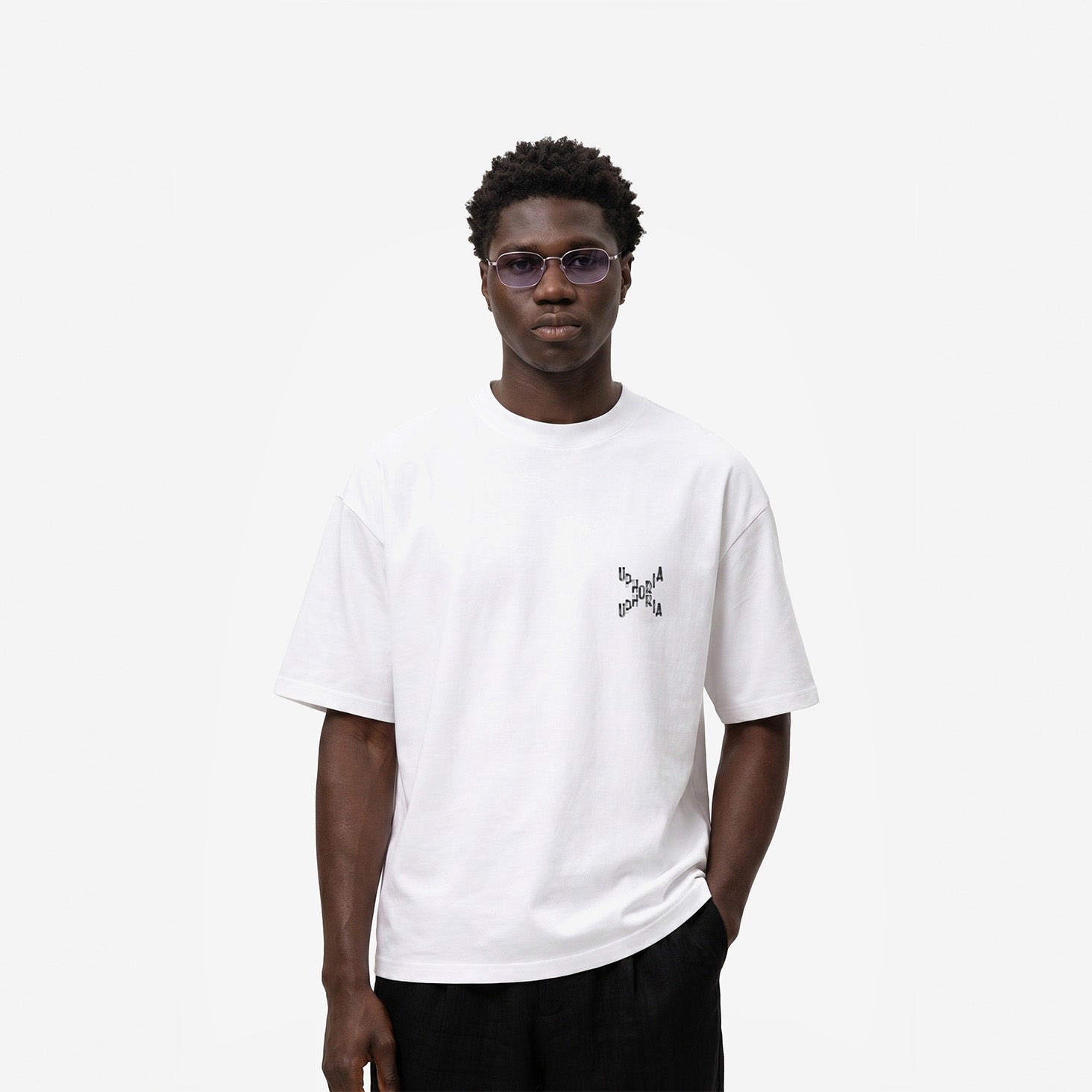 Signature Cross Tee in White – worn by model, front view