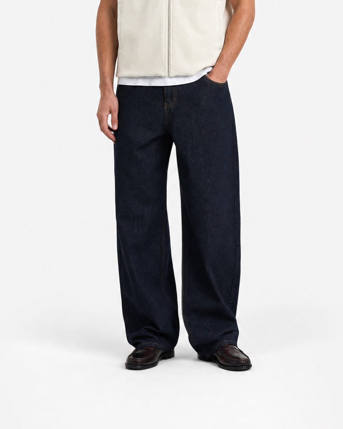 Marlow Tapered Denim in Raw Indigo – worn by model, front view
