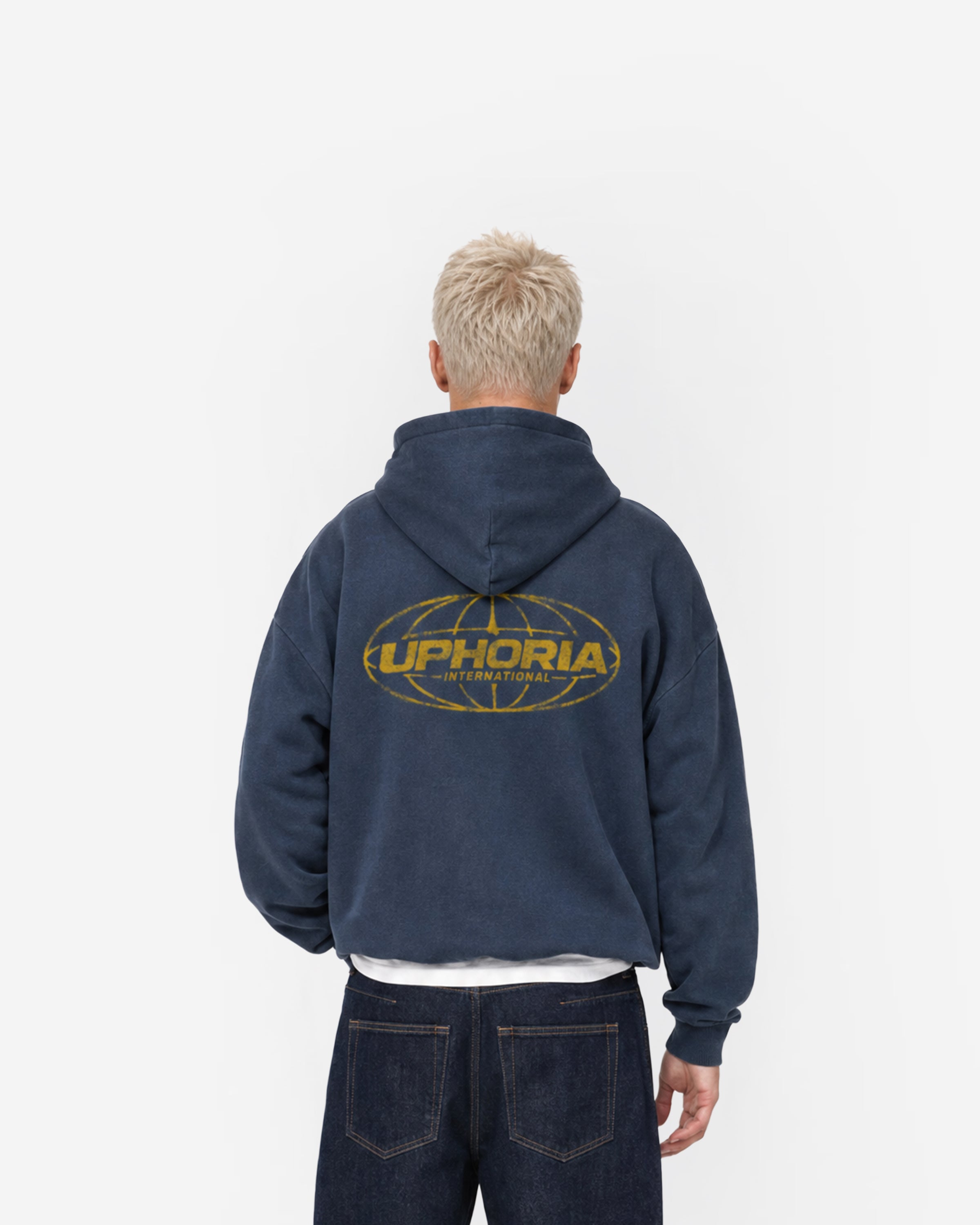 Globe Hoodie in Navy – worn by model, back view
