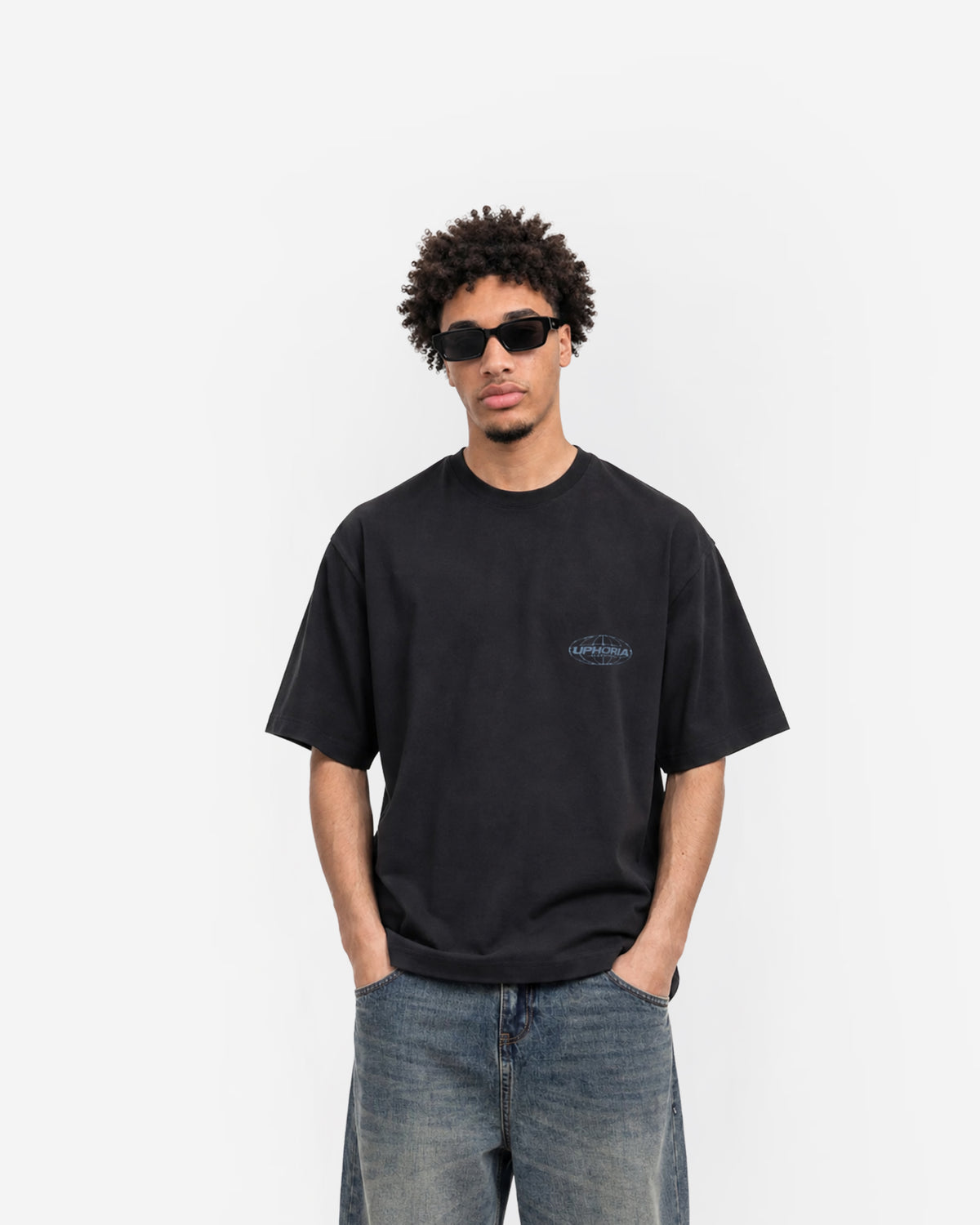 Globe Tee in Black – worn by model, front view