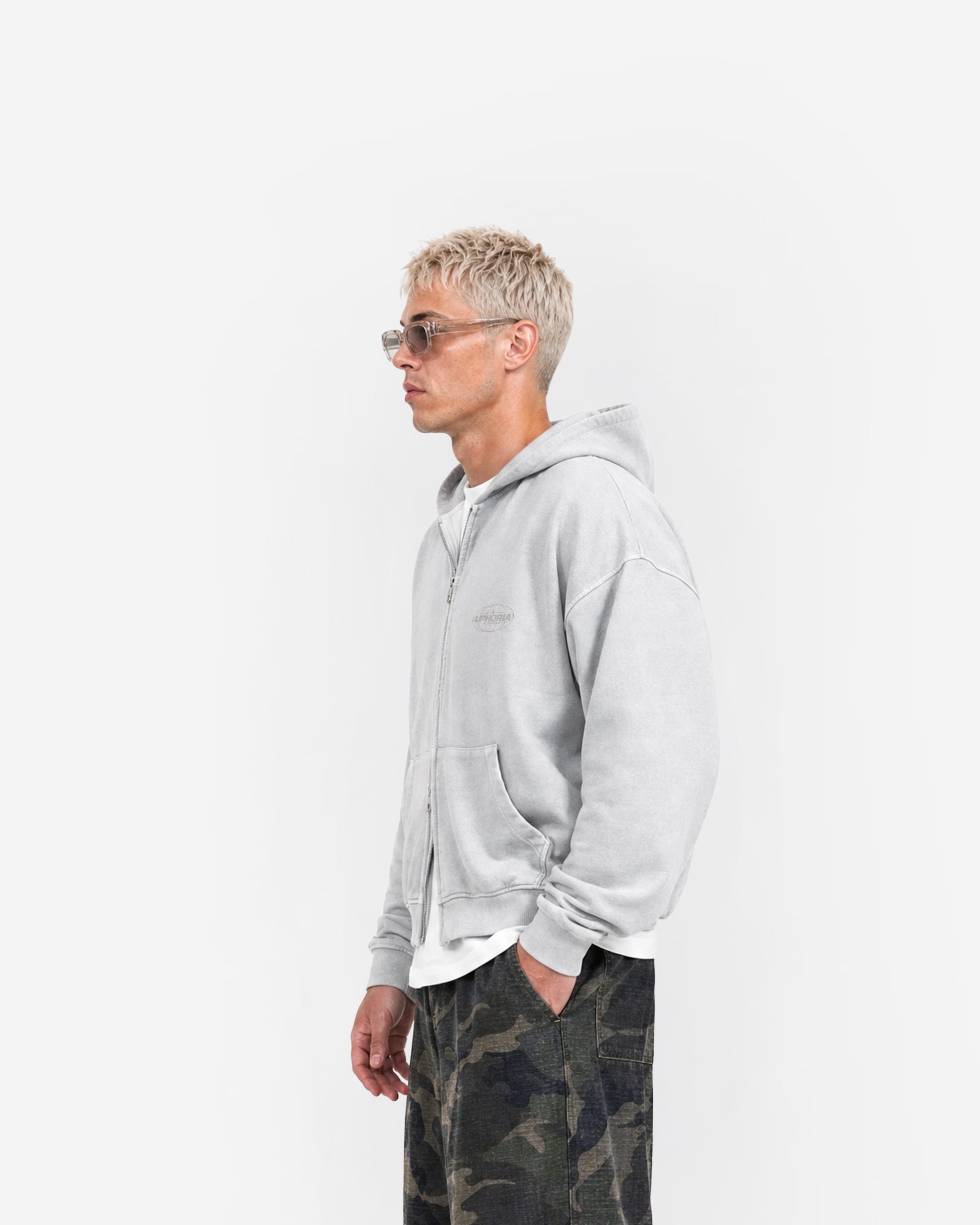 Globe Zip Hoodie in Feather Grey – worn by model, side view