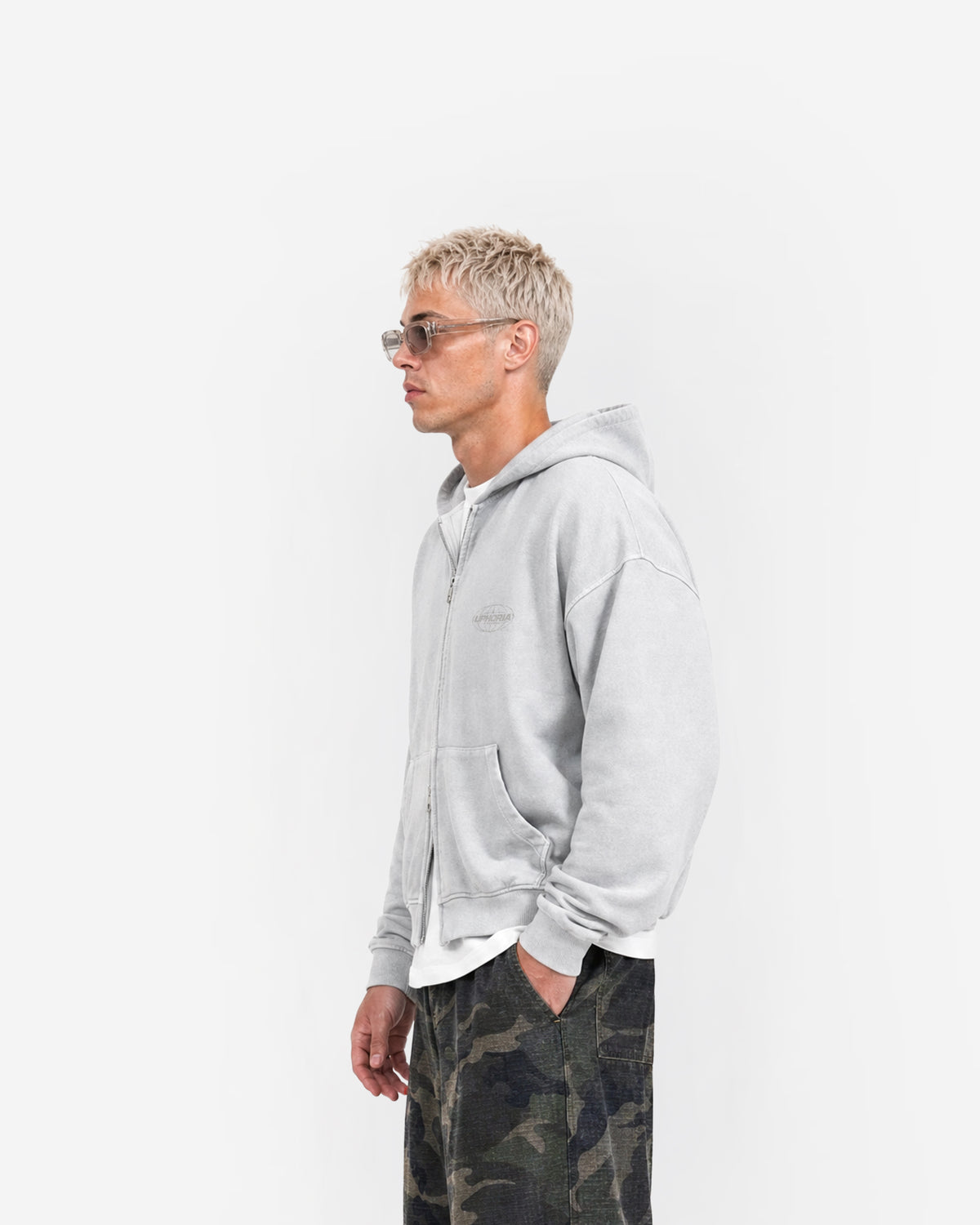 Globe Zip Hoodie in Feather Grey – worn by model, side view