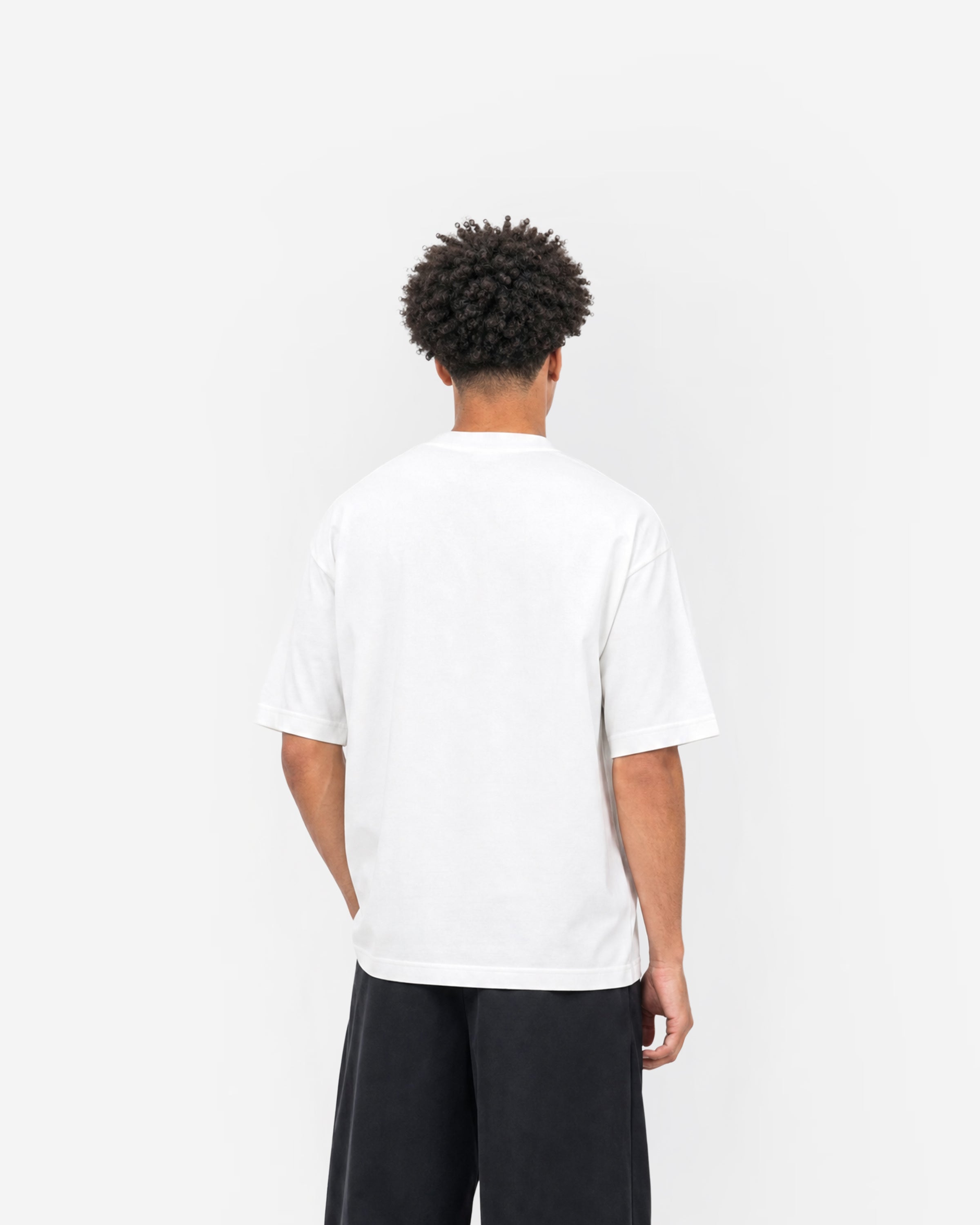 LDN Star Tee in White – worn by model, back view