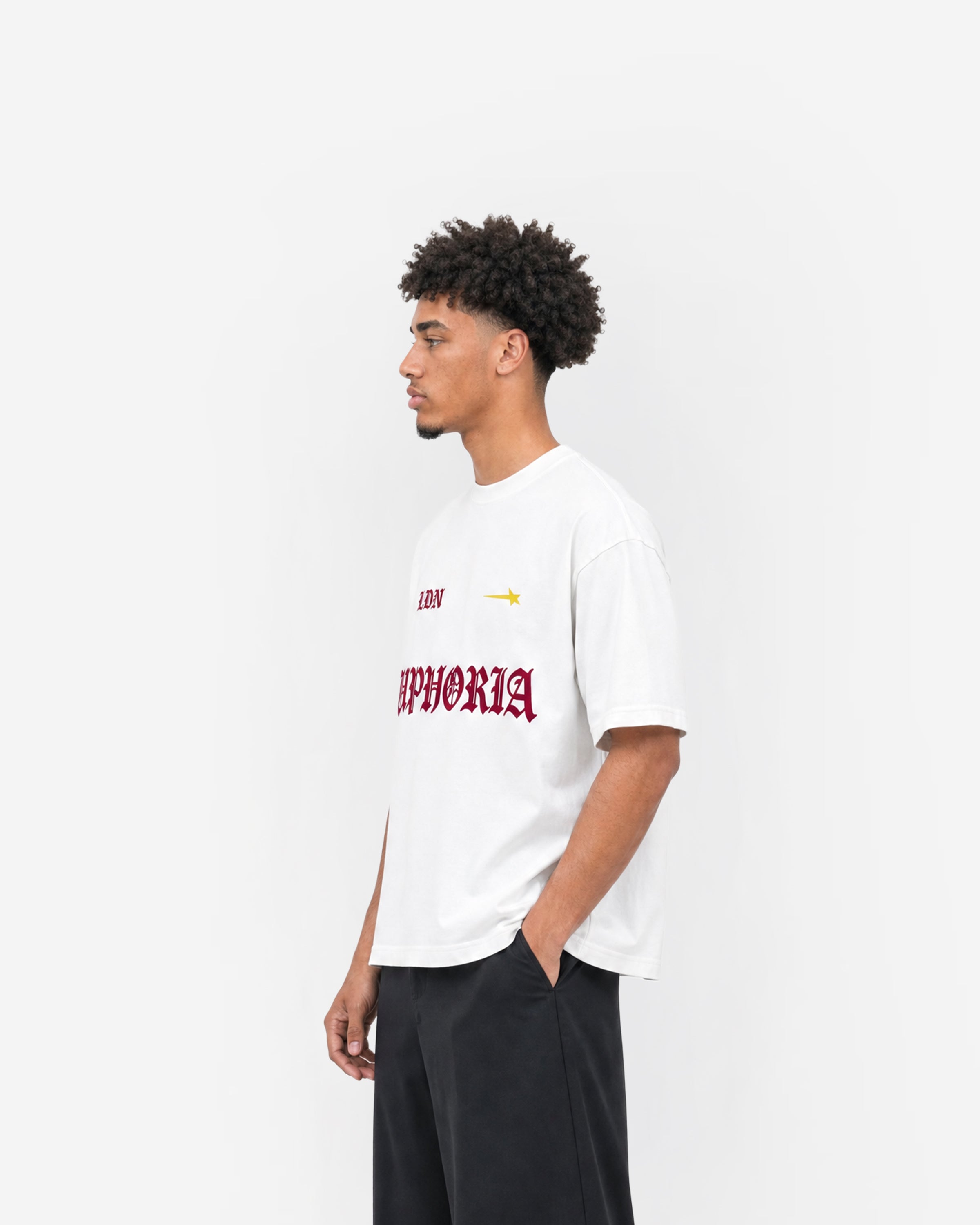 LDN Star Tee in White – worn by model, side view