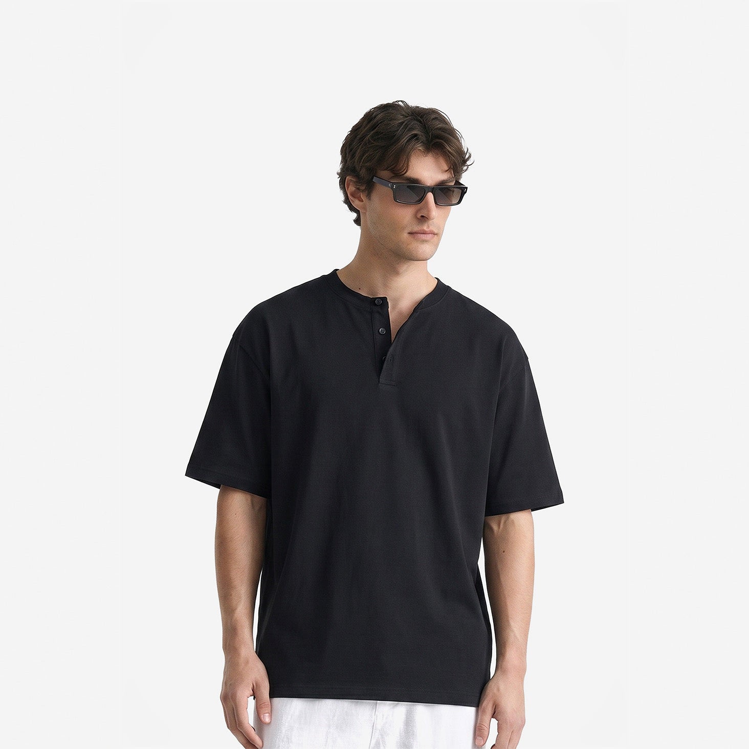 Como Henley Tee in Black – worn by model, front view