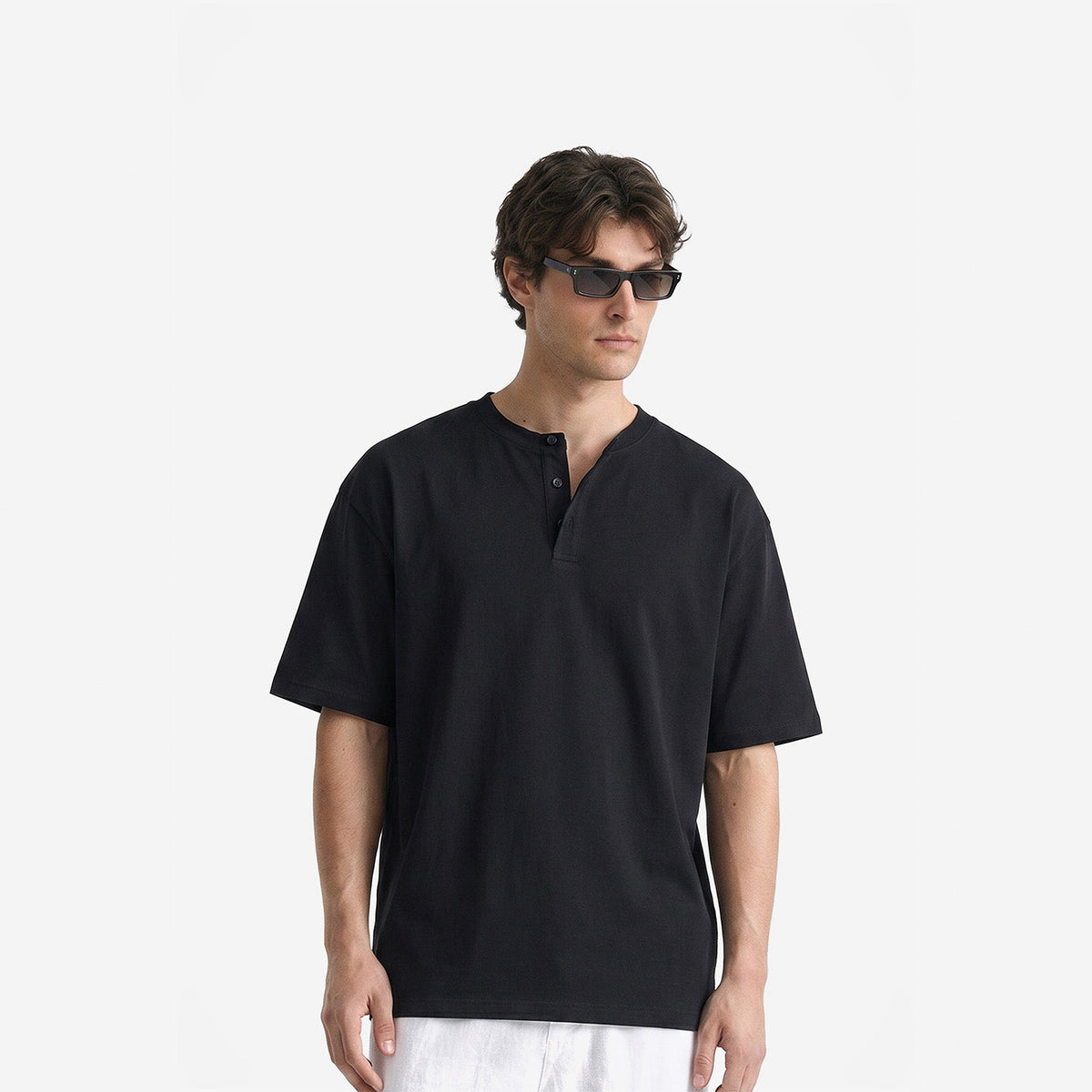 Como Henley Tee in Black – worn by model, front view