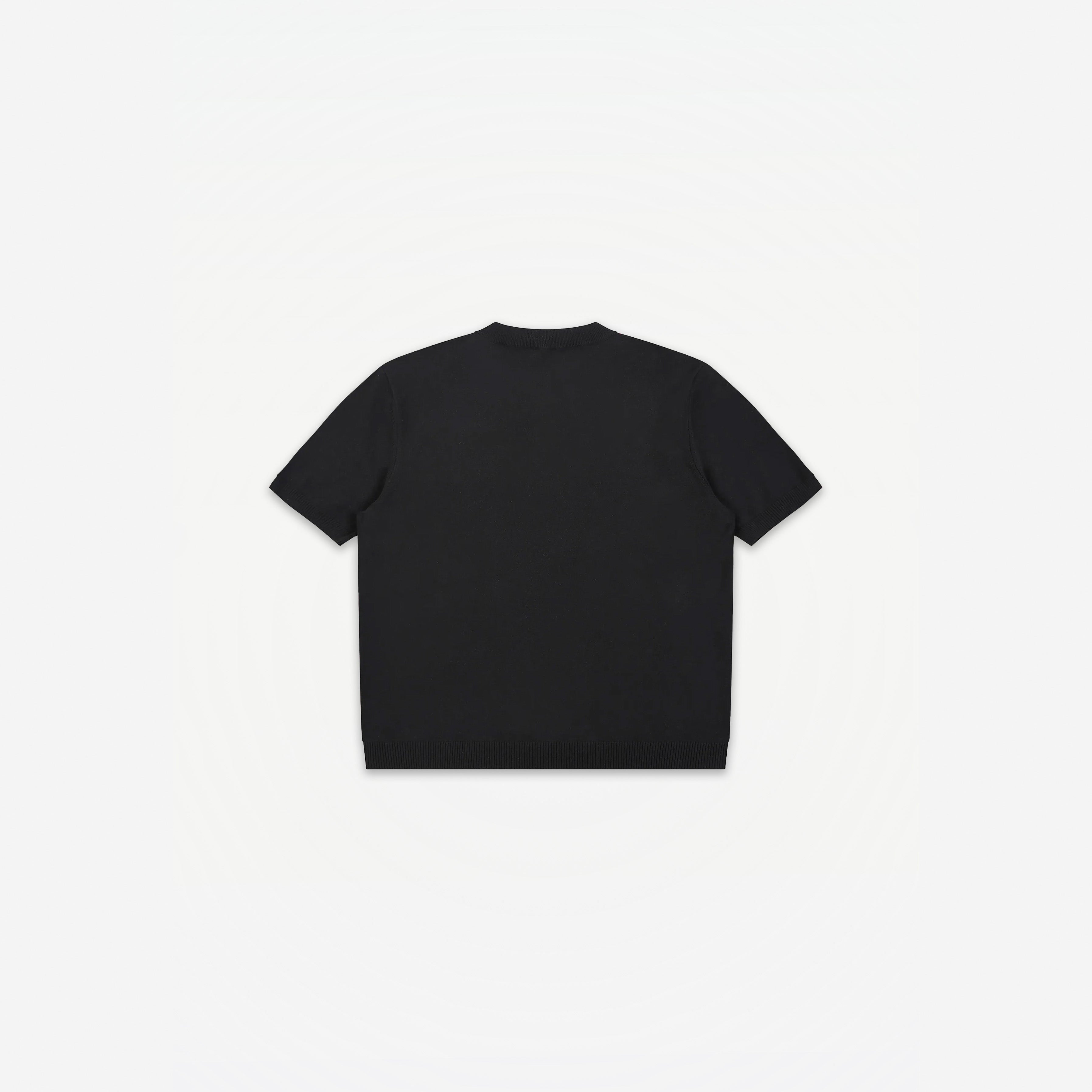 Como Henley Knit Tee in Black – flat lay, back view