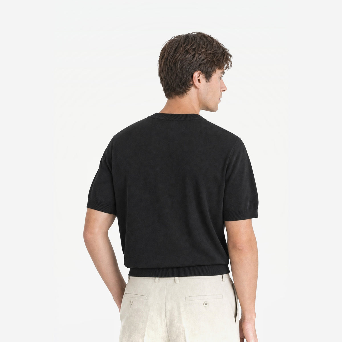 Como Henley Knit Tee in Black – worn by model, back view