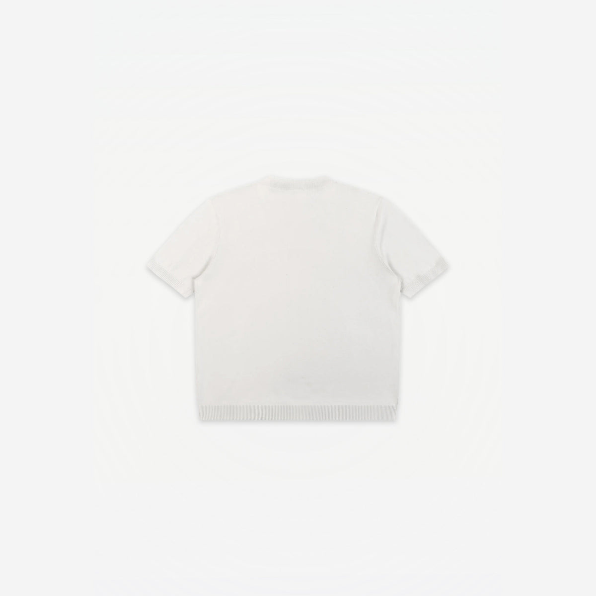 Como Henley Knit Tee in White – flat lay, back view