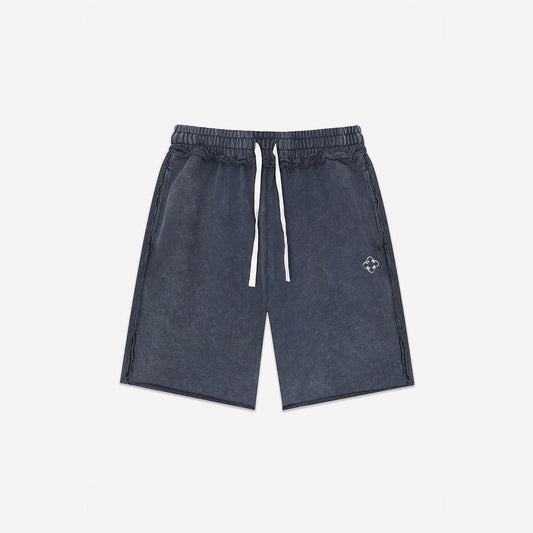 Raw Edge Emblem Shorts in Washed Navy – flat lay, front view
