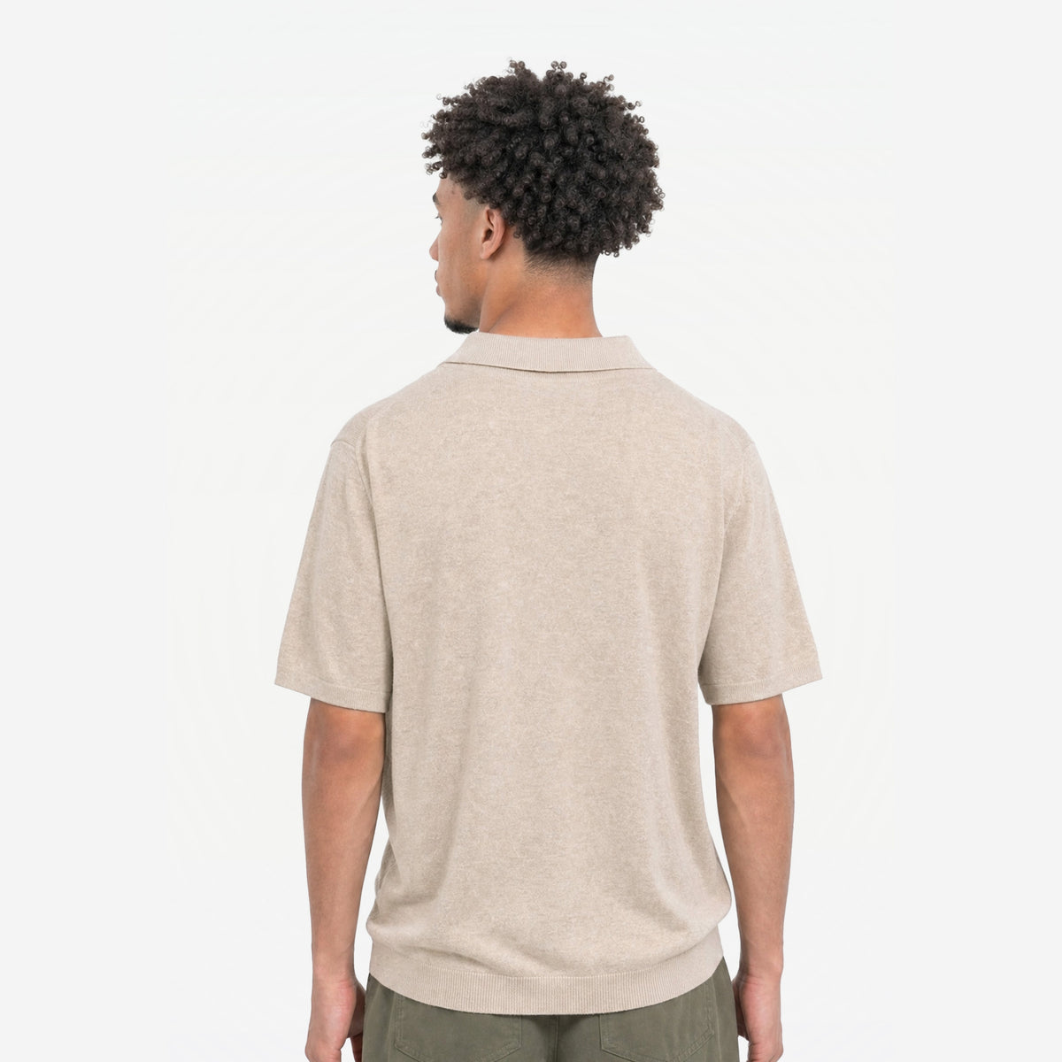 Bellagio Polo in Crema – worn by model, back view