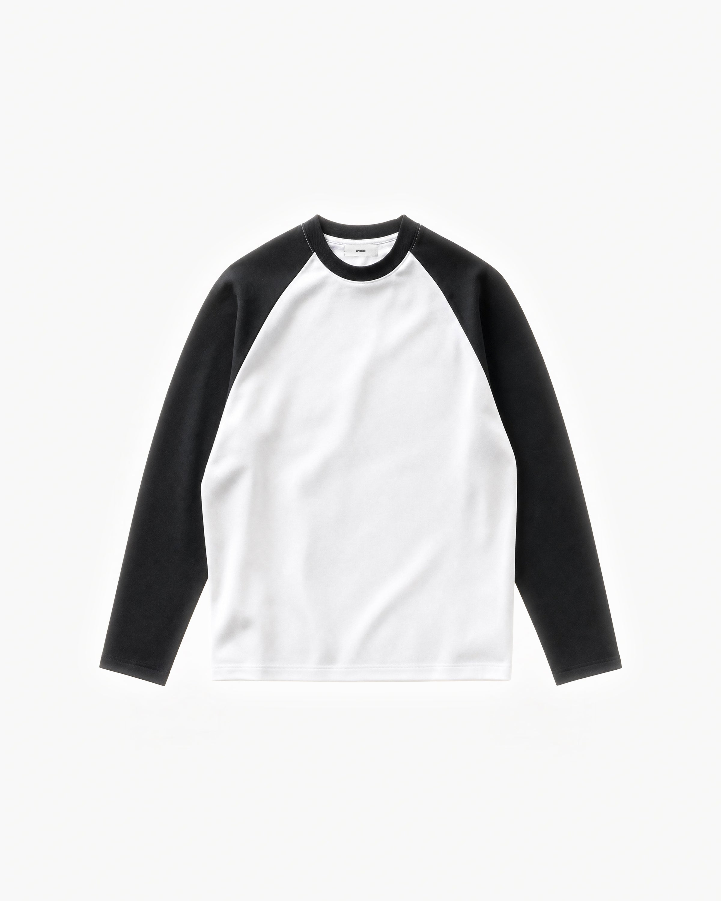Pavilion Raglan Long Sleeve in White / Black – flat lay, front view