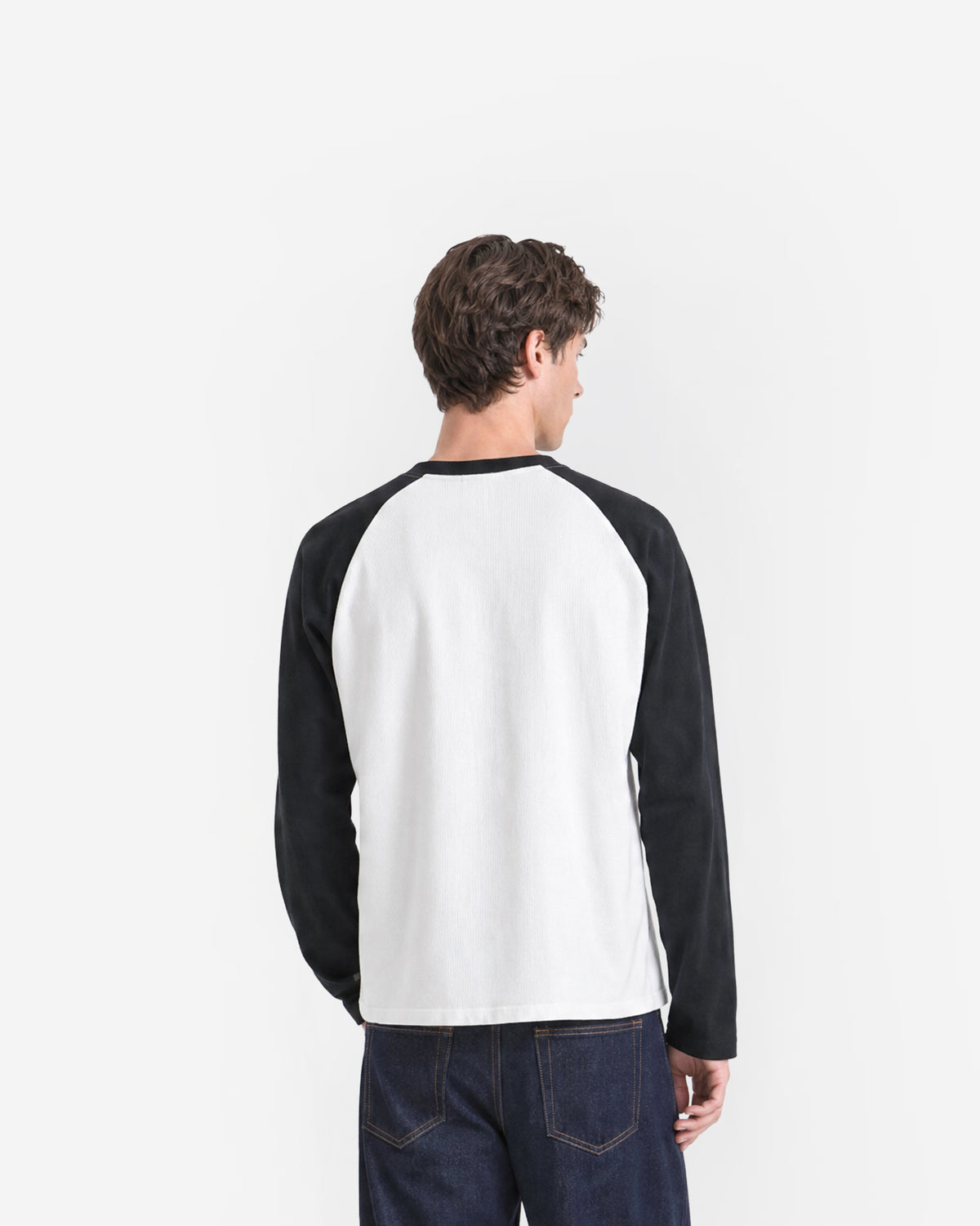 Pavilion Raglan Long Sleeve in White / Black – worn by model, back view