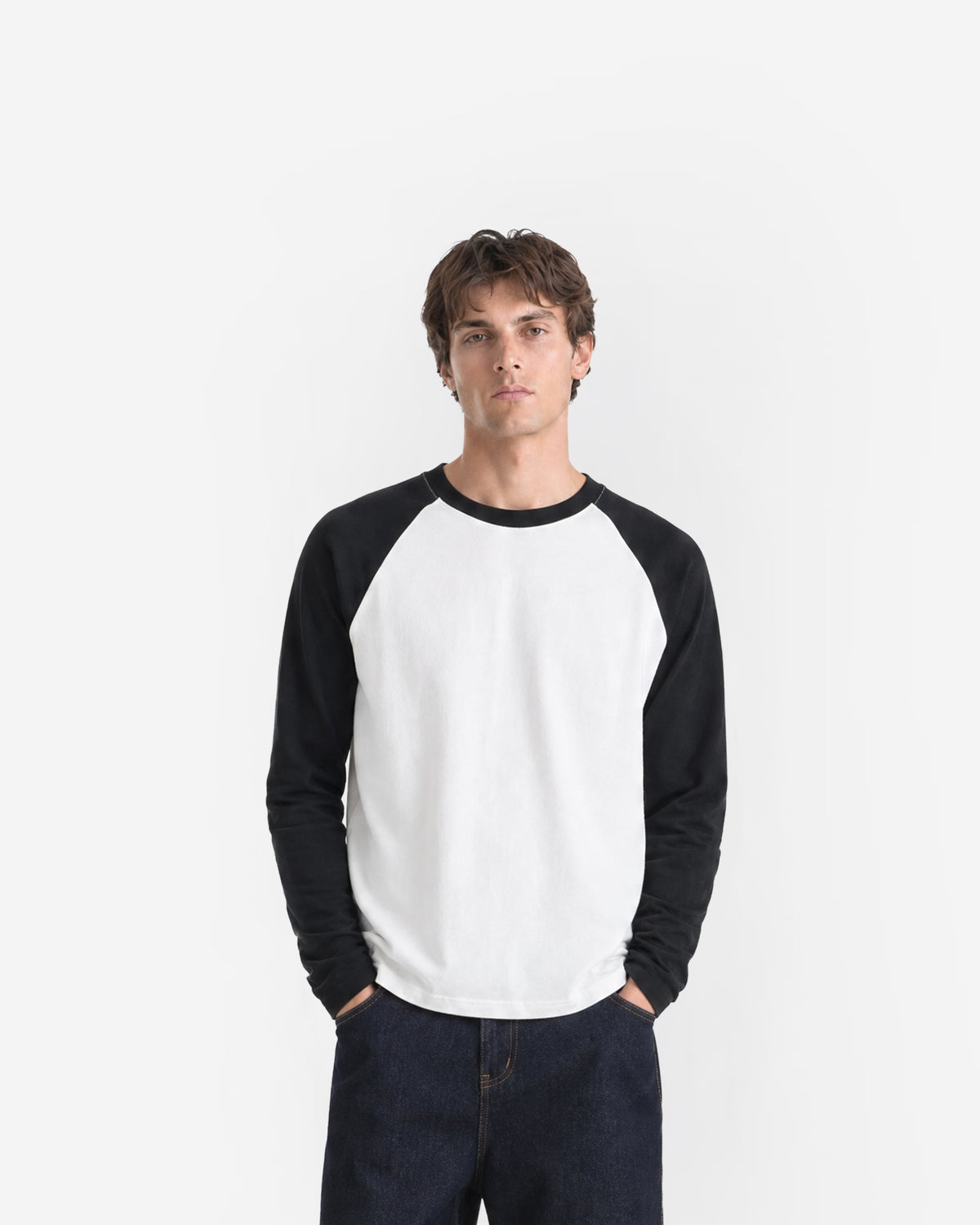 Pavilion Raglan Long Sleeve in White / Black – worn by model, front view