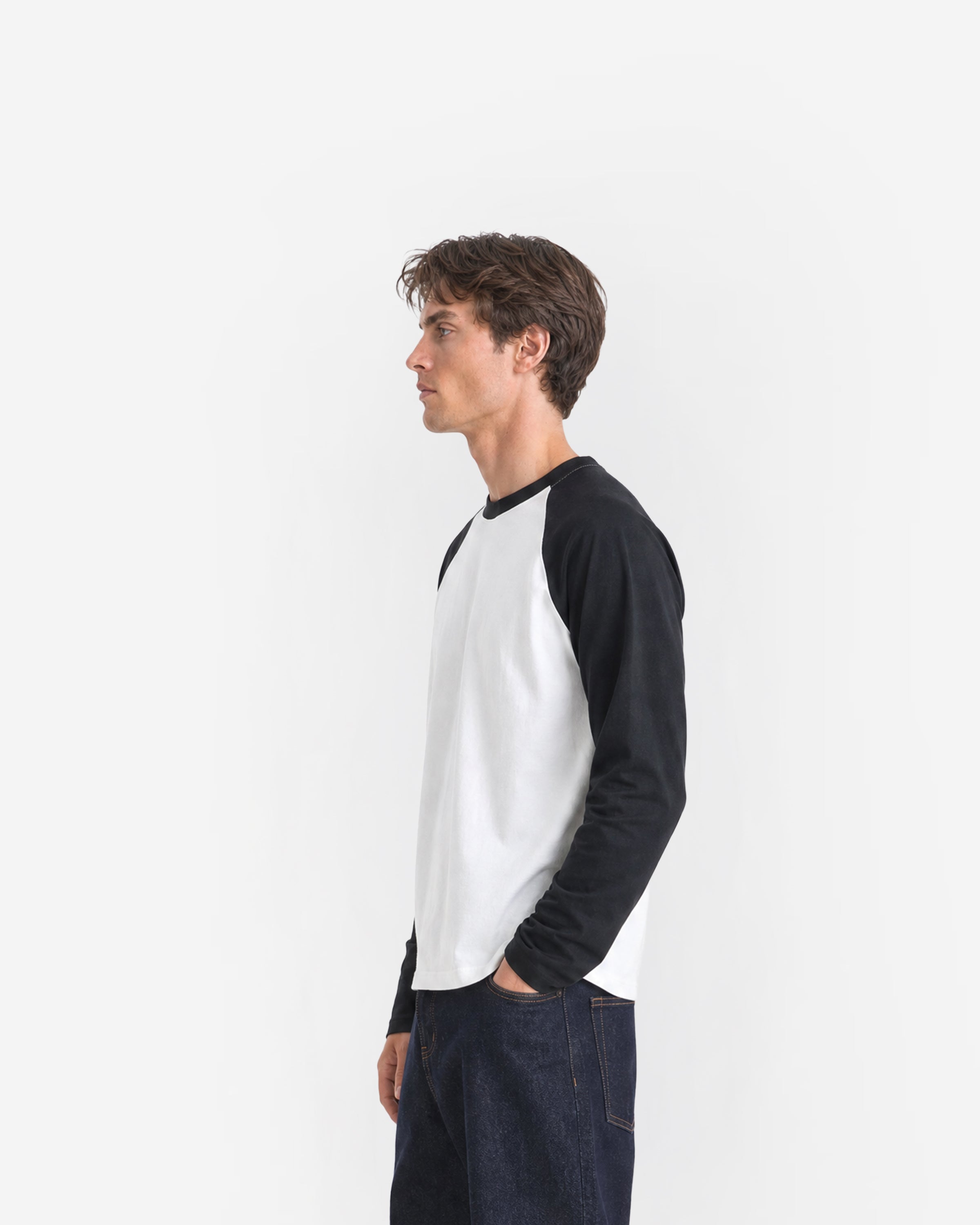 Pavilion Raglan Long Sleeve in White / Black – worn by model, side view