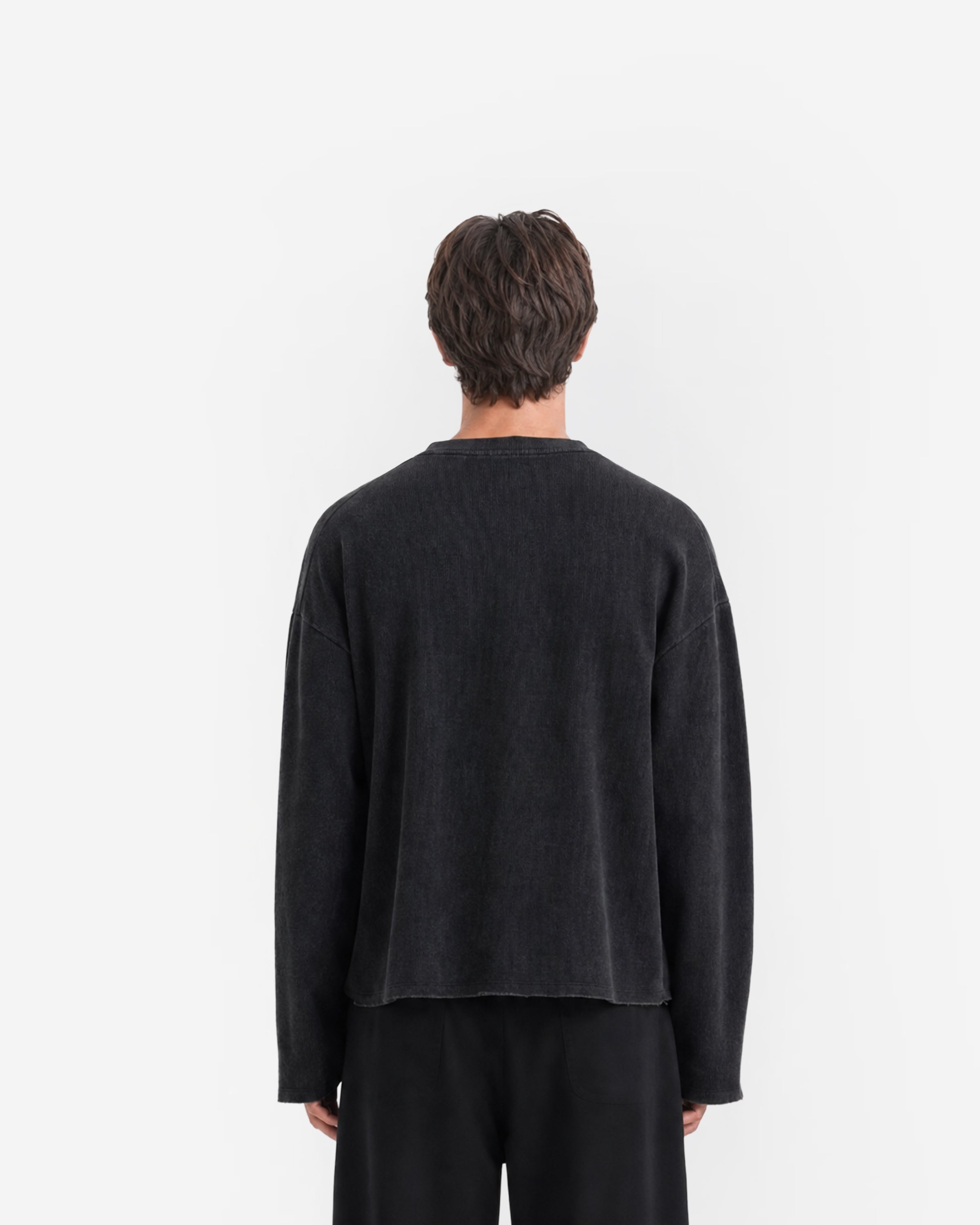 Raw Edge Long Sleeve Tee in Jet Black – worn by model, back view
