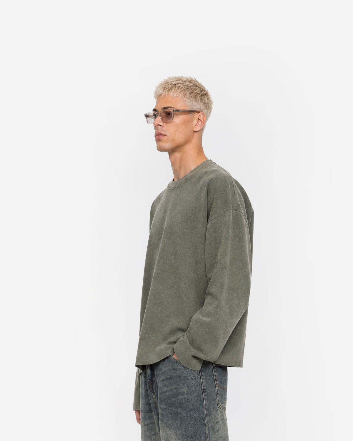 Raw Edge Long Sleeve Tee in Olive Green – worn by model, side view