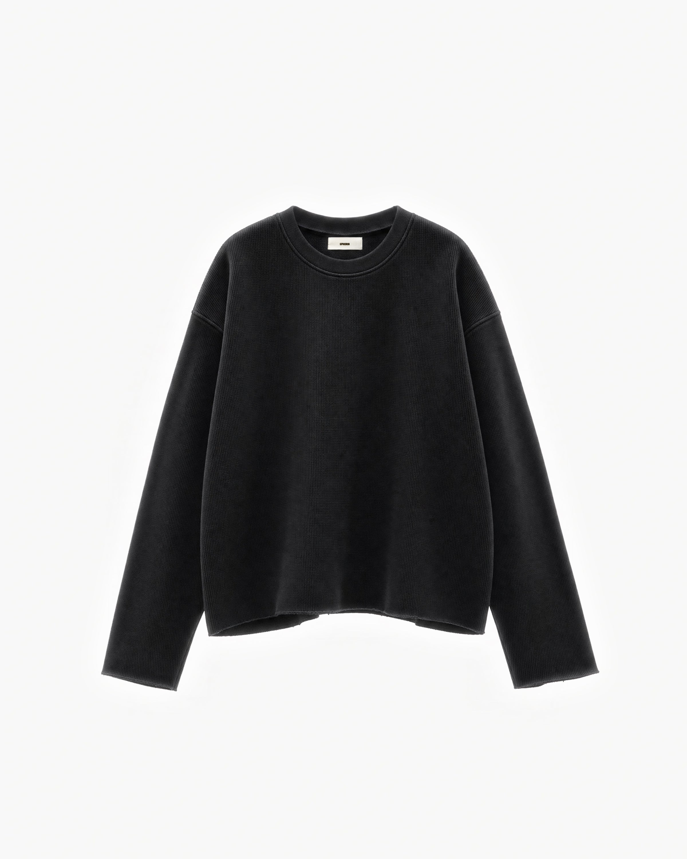 Raw Edge Long Sleeve Tee in Jet Black – flat lay, front view