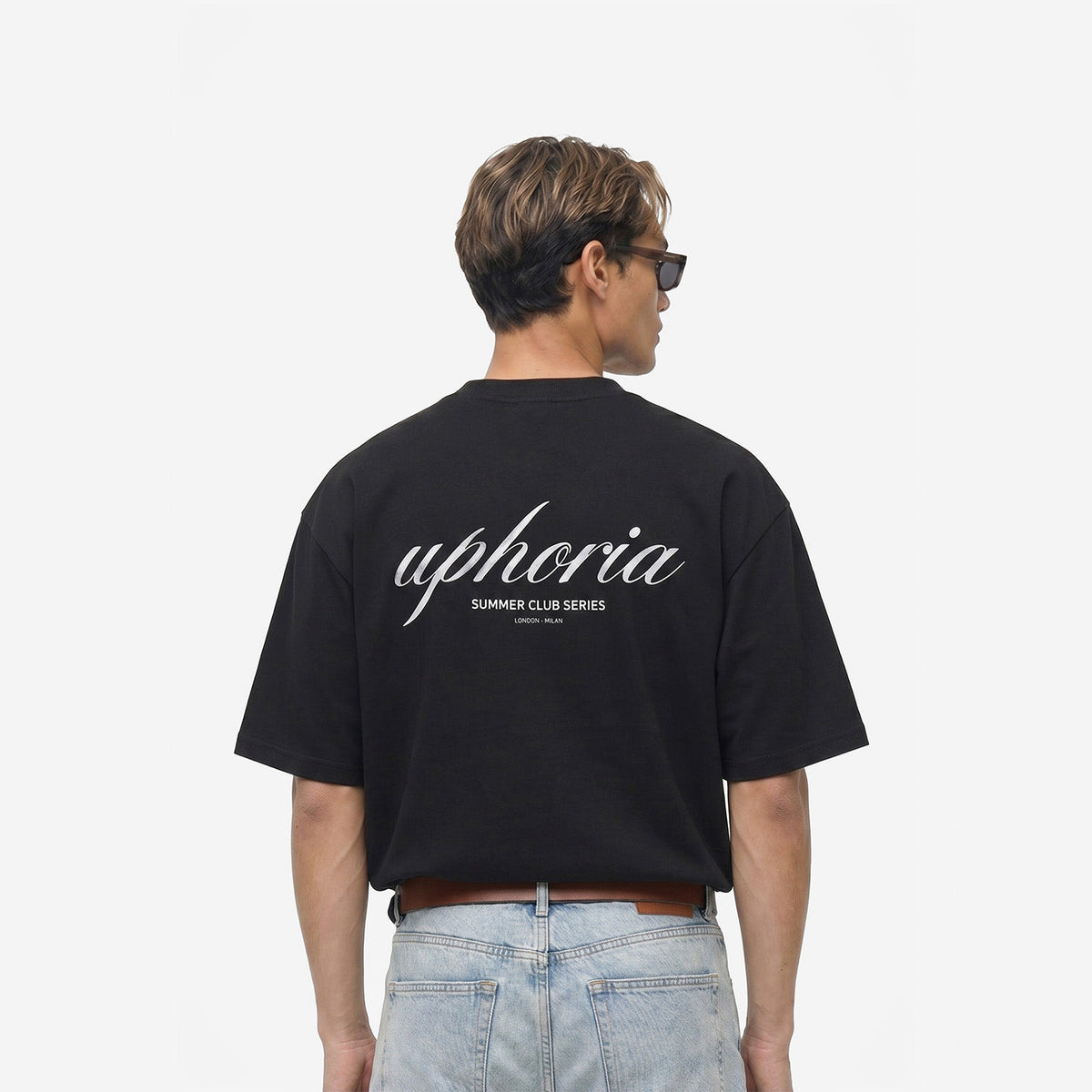 Summer Club Series Tee in Black – worn by model, back view