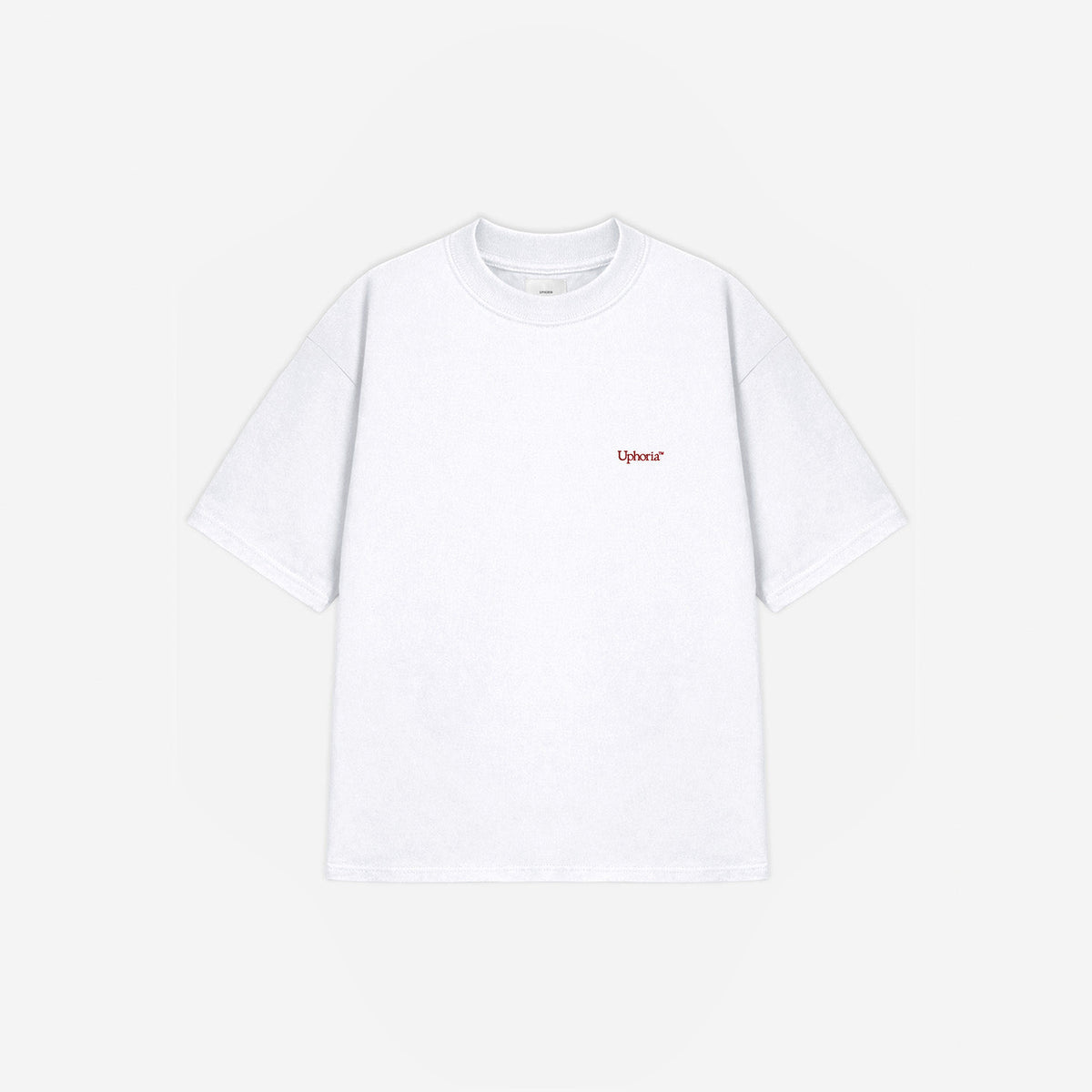 Emblem Motion Tee in White - Red Graphic – flat lay, front view