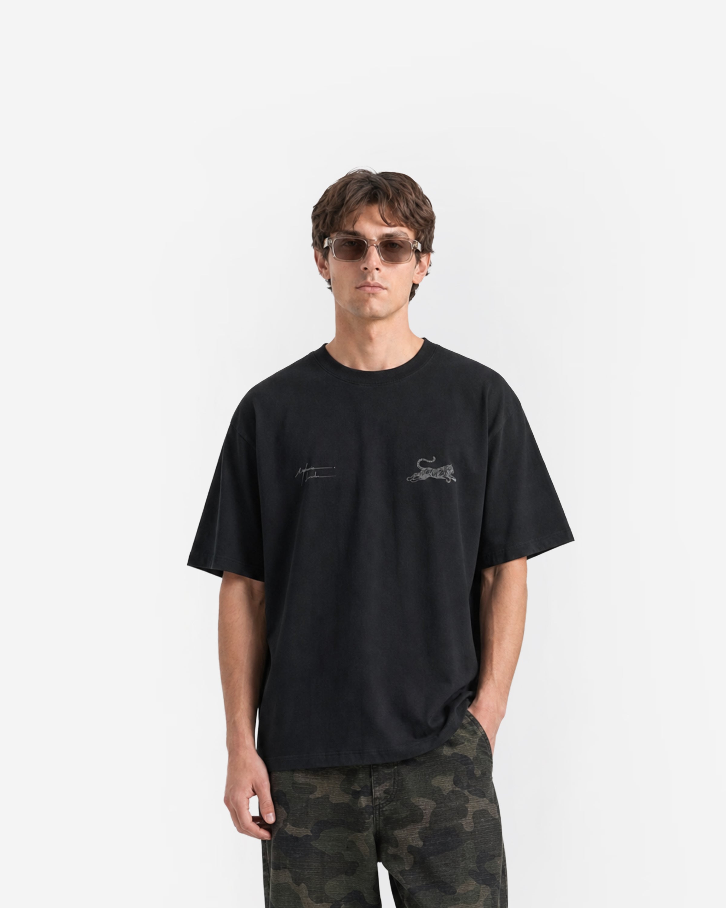 Tiger Signature Tee in Black – worn by model, front view
