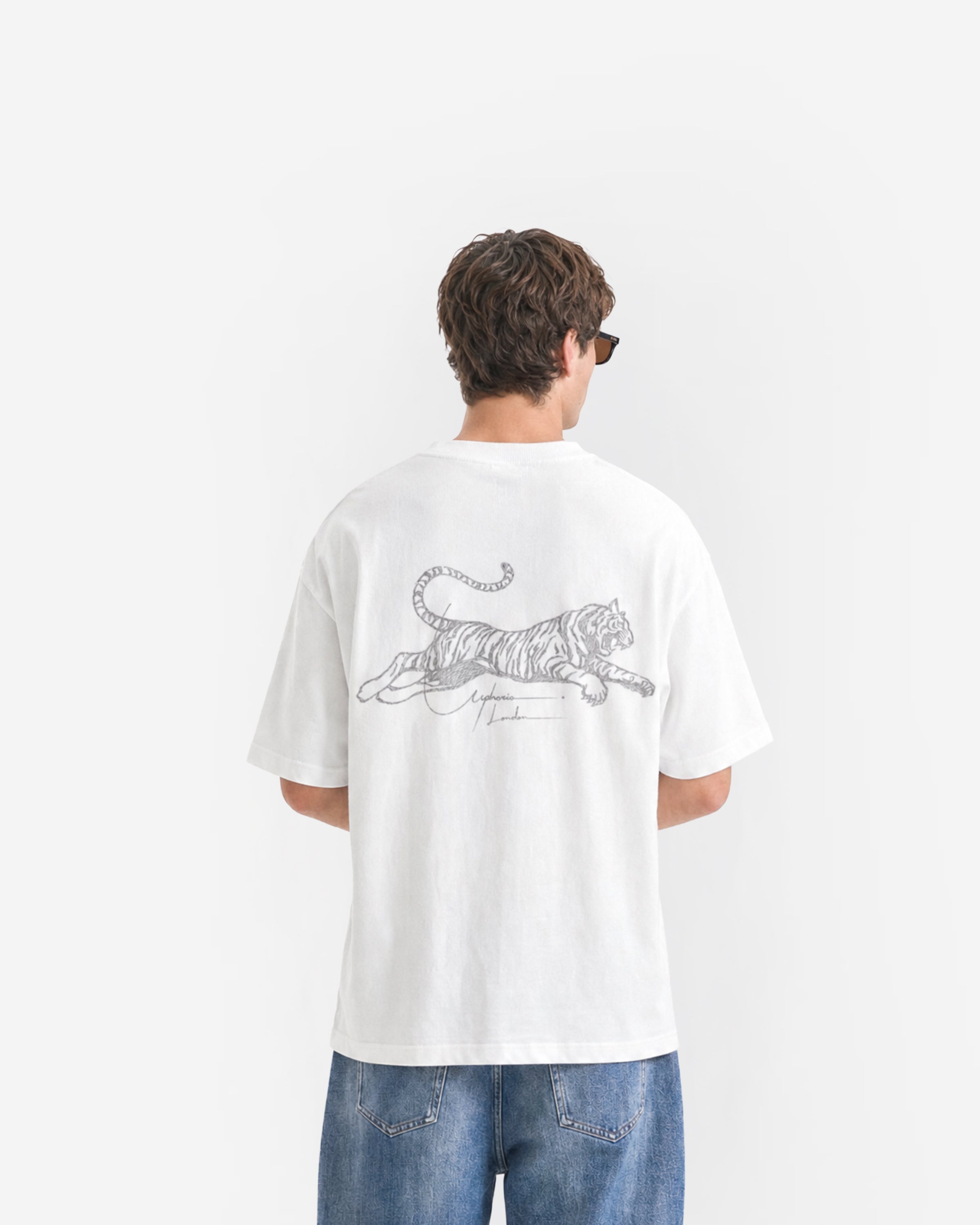 Tiger Signature Tee in White – worn by model, back view