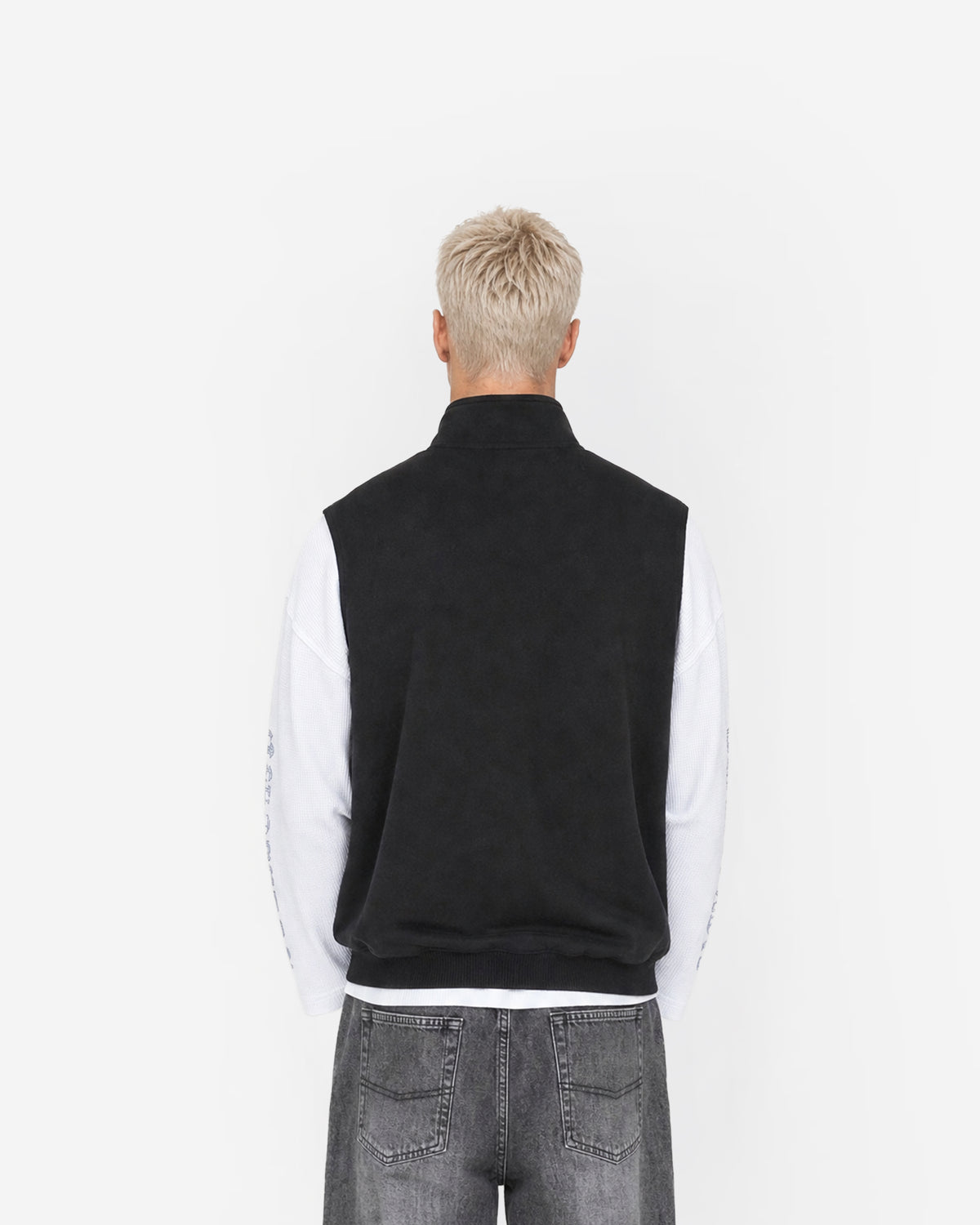 Paddock Gilet in Black – worn by model, back view