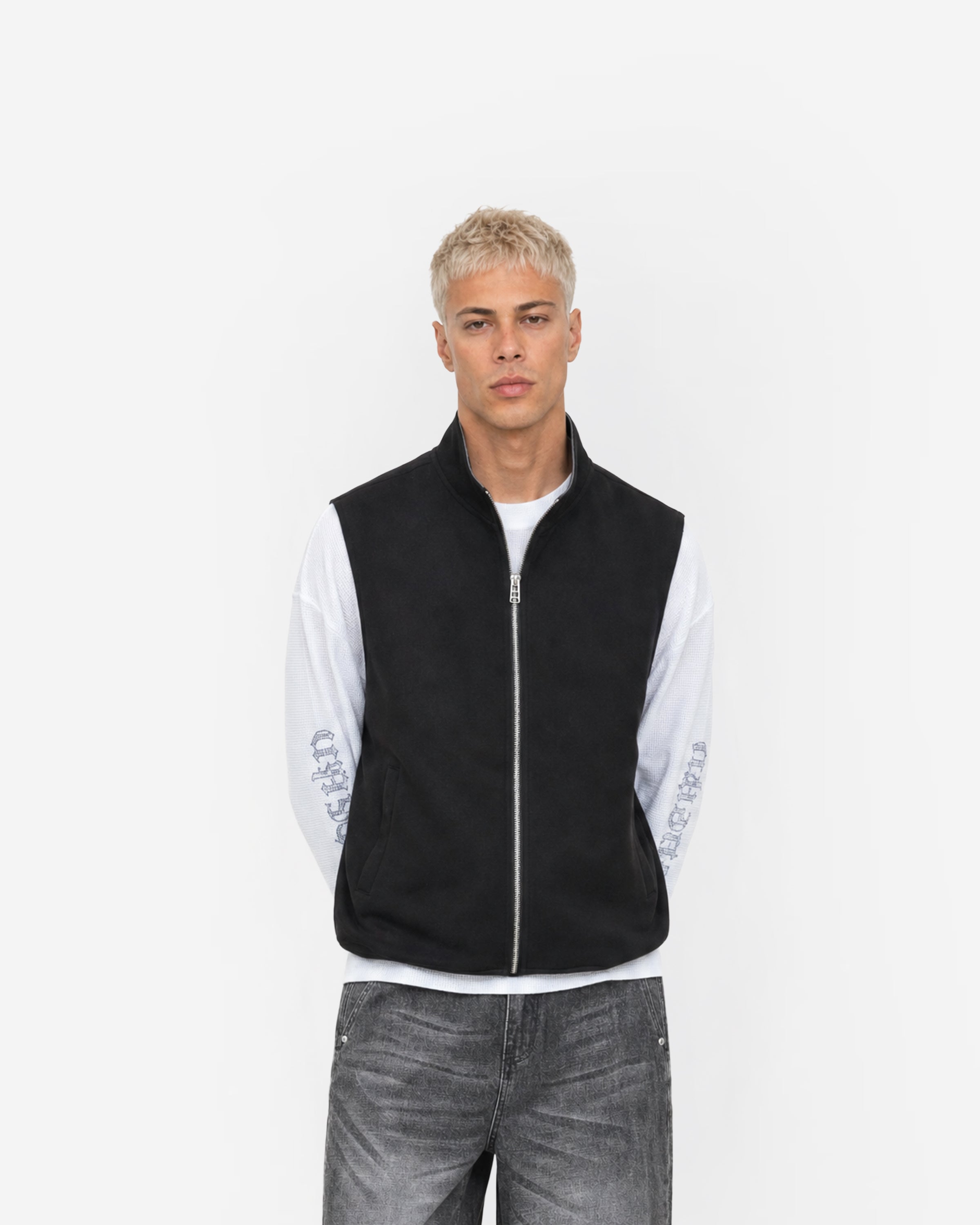 Paddock Gilet in Black – worn by model, front view