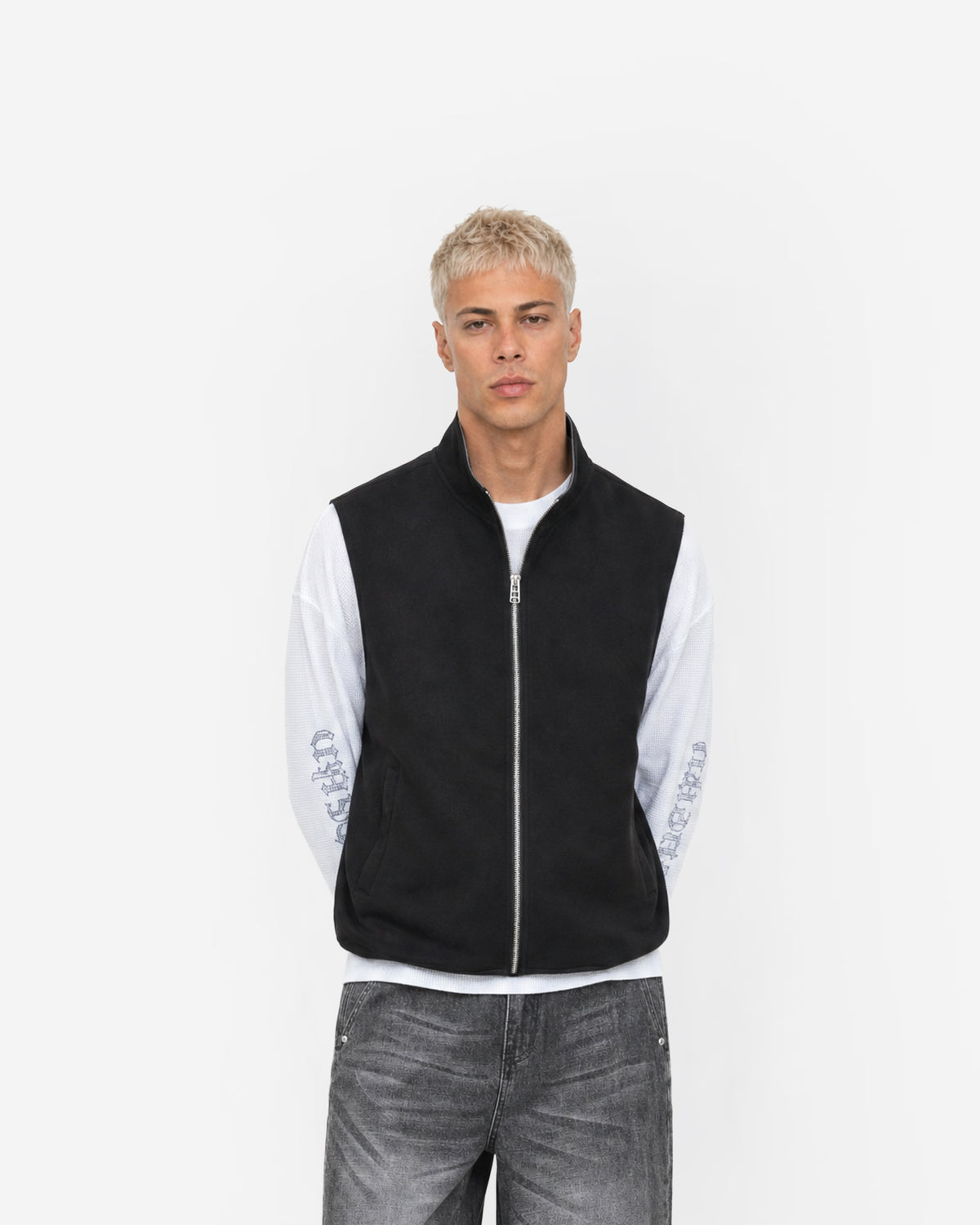 Paddock Gilet in Black – worn by model, front view