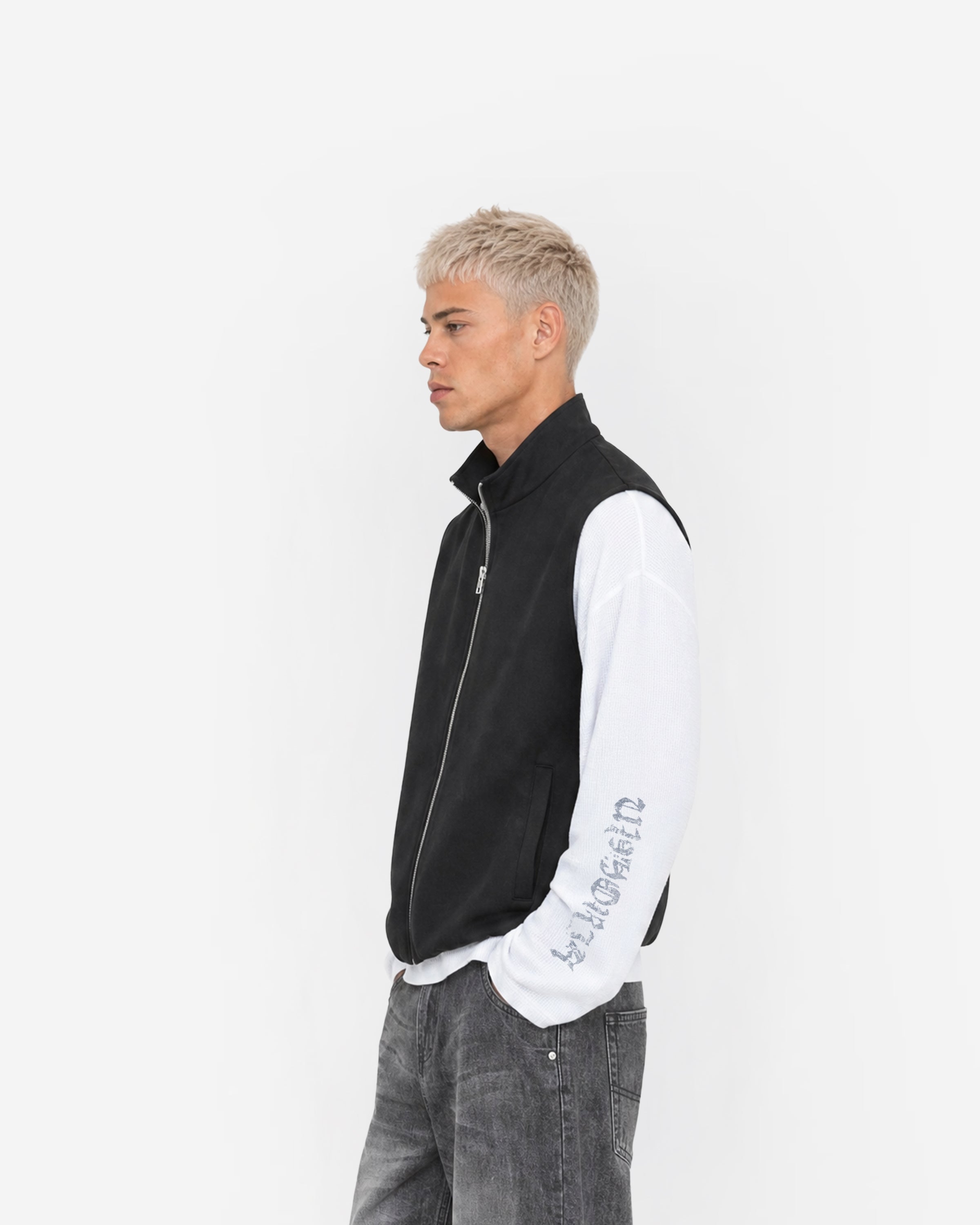 Paddock Gilet in Black – worn by model, side view