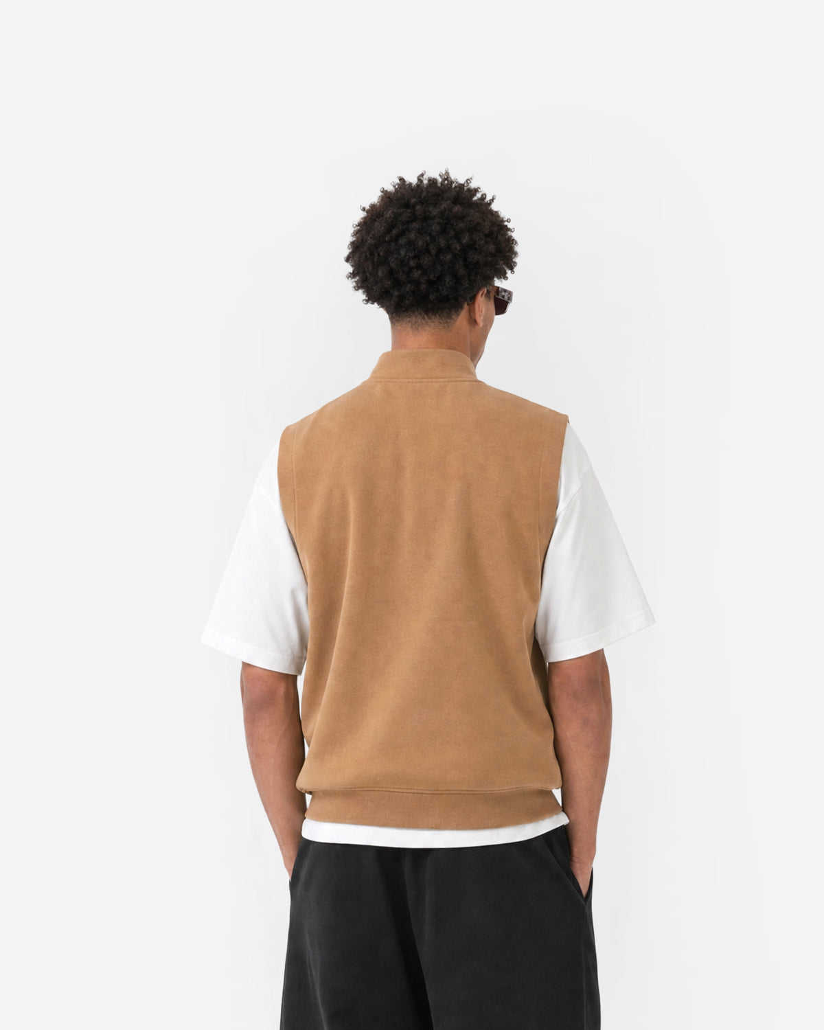 Paddock Gilet in Brown – worn by model, back view
