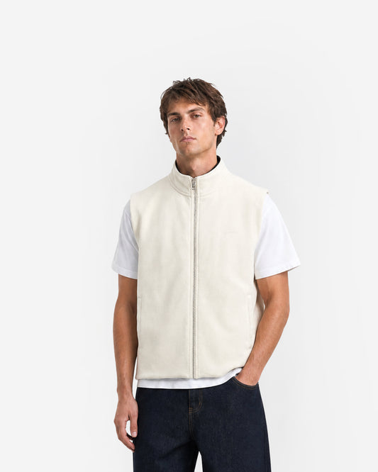 Paddock Gilet in Ecru – worn by model, front view