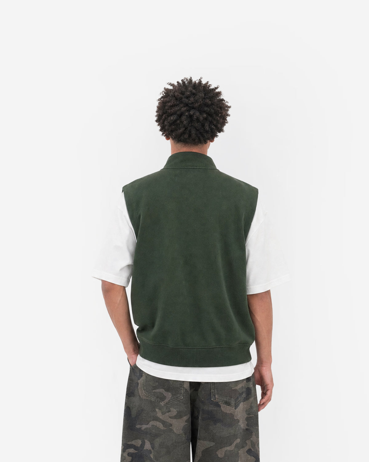 Paddock Gilet in Forest Green – worn by model, back view